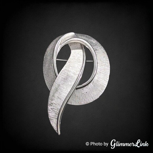 Trifari Jewelry - Vintage 60s Crown Trifari Modernist Ribbon Swirl Silver Tone Brooch